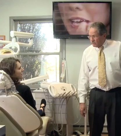Our dentists explaining a procedure to a patient